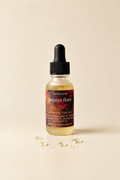 Papaya Fiore Face Oil on a warm ivory background