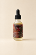 Petal Dew Face Oil on a warm ivory background