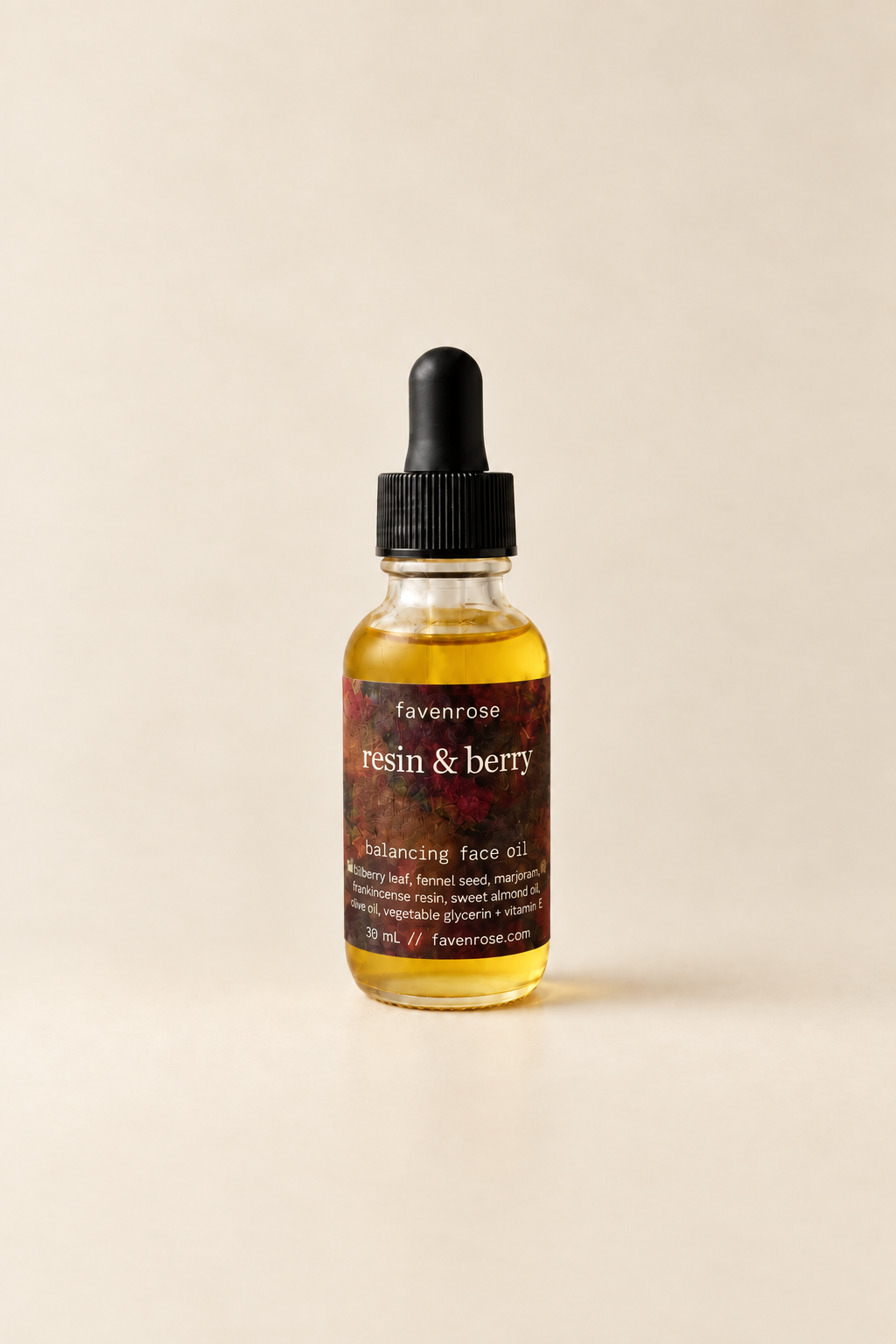 Resin & Berry Face Oil on a warm ivory background